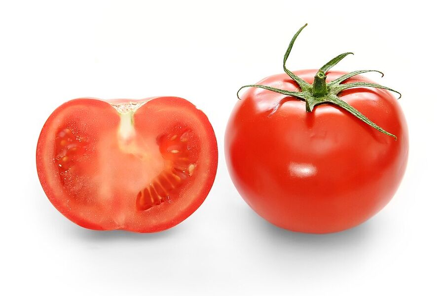 Cross-section of a ripe red tomato (Solanum lycopersicum) showing locules and seeds in gel